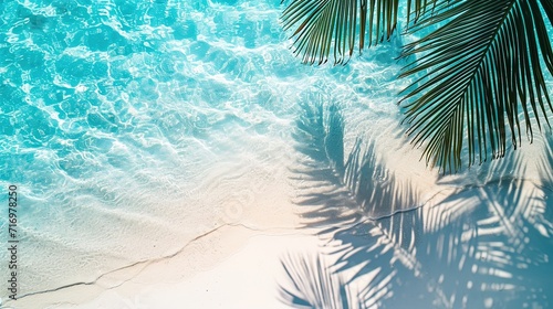 top view of water surface with tropical leaf shadow. Shadow of palm leaves on white sand beach. Beautiful abstract background concept banner for summer vacation at the beach, generative ai © Naseem