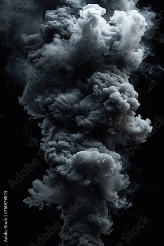 Black and white photo of smoke billowing out of a chimney. Suitable for various uses