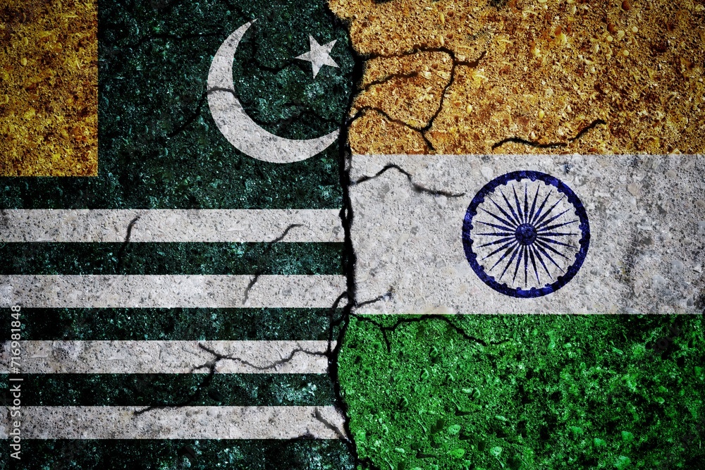 India and Kashmir concept flags on a wall with a crack. Kashmir and India war crisis, political conflict, economy, relationship, trade concept