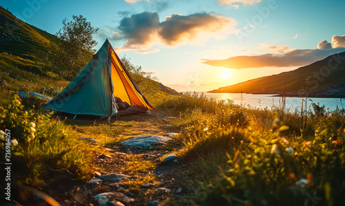 Solitary Tent on a Lush Green Meadow by the Seaside at Sunset, Offering a Peaceful and Scenic Escape into Nature's Serenity and Camping Adventure