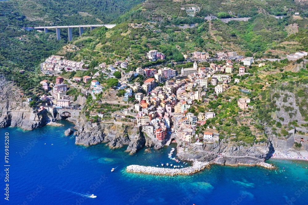 Aerial view of Riomaggiore, Riomaggiore in the province of La Spezia in Liguria. An ancient village on the Riviera di Levante, it constitutes the easternmost and southernmost of the Cinque Terre