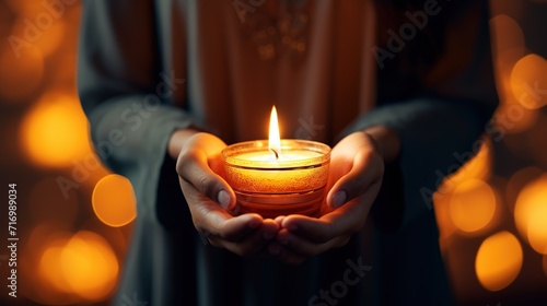 AI generated Hands Holding Candle With Shining Flame And Blurry Lights - Defocused Hope Concept Free Photo