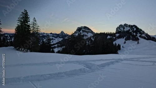4K Snow-Capped Mountain Range in Cold Morning Sunlight