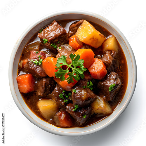 Bowl of beef stew with vegetables top view isolated on white background