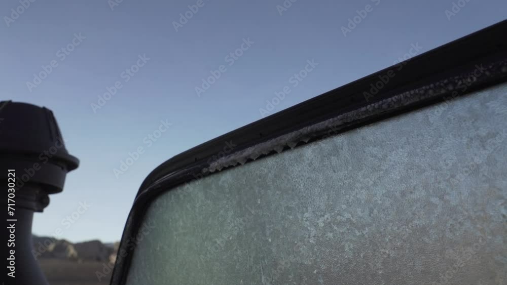 Car windows completely frozen over and full of ice, along the lagoon route of the Altiplano in the Andes mountains of Bolivia. Car windows completely frozen over and full of ice, along the lagoon route of the Altiplano in the Andes mountains of Bolivia.