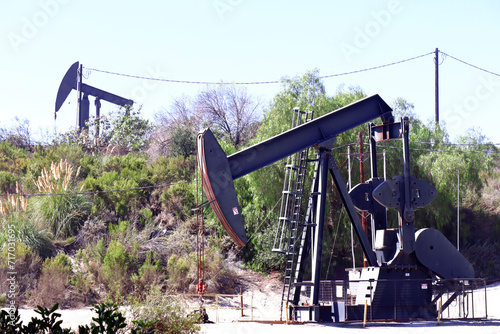 The Inglewood Oil Field pumpjack located in the Baldwin Hills, Los Angeles, California photo