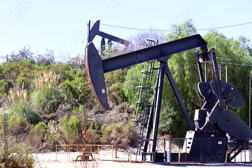 The Inglewood Oil Field pumpjack located in the Baldwin Hills, Los Angeles, California photo