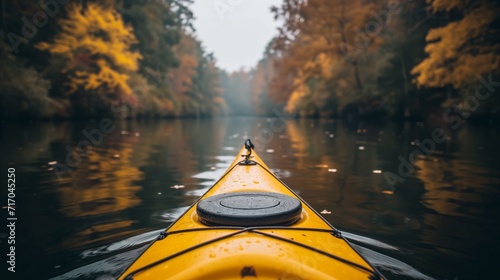 Autumn kayaking adventure through serene forest river
