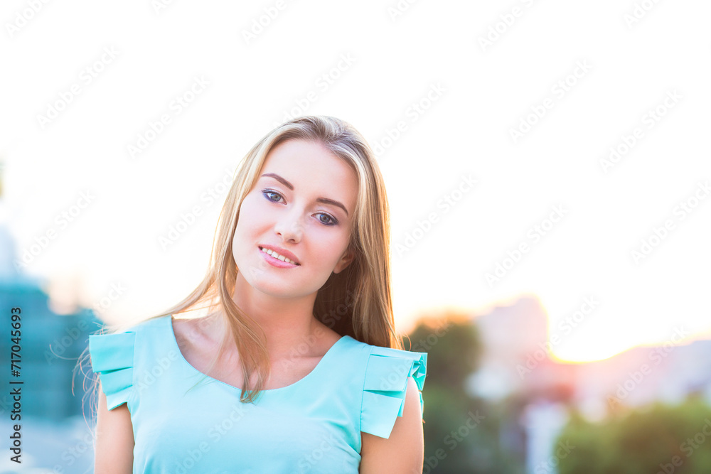 Outdoors portrait of beautiful young blond woman Outdoors portrait of beautiful young blond woman