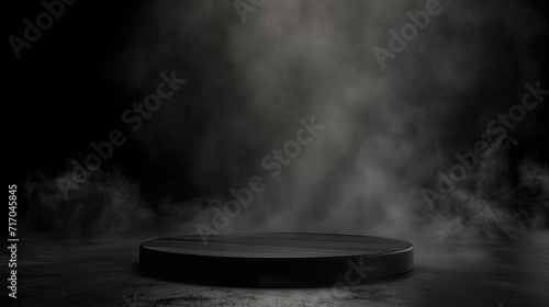 A round black wood slab enveloped in swirling smoke, creating an atmospheric and moody visual on a dark background.