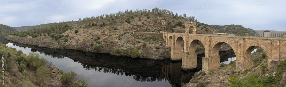 Panoramic photograph of the Alcántara Bridge over the Tagus River. An authentic engineering work carried out by the Roman Empire. Alcantara, Caceres, Spain