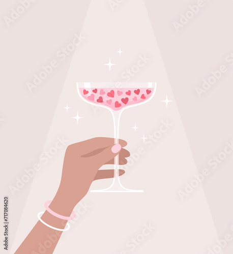 Hand holding drink glass with hearts inside on beige background. Vector illustration in flat style