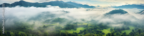 Mountains panorama with coluds and fog. banner