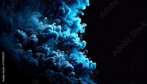 Ethereal Blue Smoke Border on Black Background - Wide Screen Room for Text photo