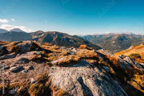 Mountain Tatras landscape. View from ridge of the Poland Tatras. Hiking from Kasprowy Wierch peak to Gievont peak . View on zakopane and Ticha valley. photo