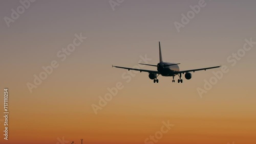 Wallpaper Mural Airplane landing to airport runway at sunset, plane arrivals, international airport spotting, boarding of big passengers international flight. Torontodigital.ca