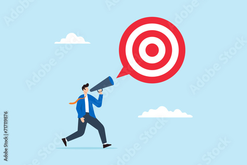 Businessman announce new goal with megaphone