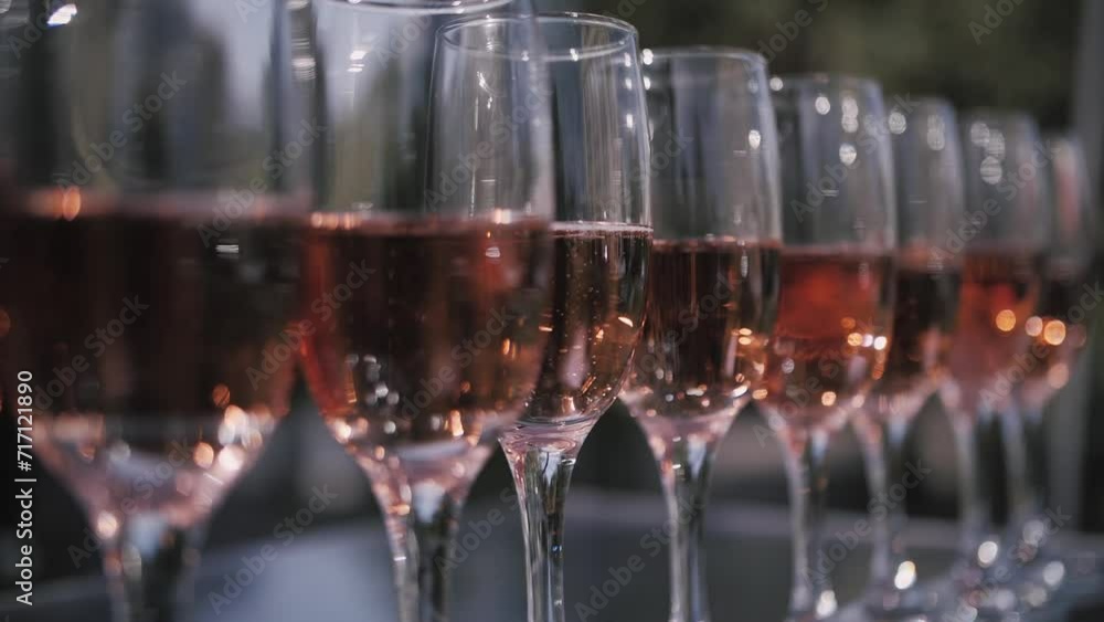 Champagne glasses stand in a row Champagne glasses stand in a row