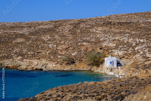 Fototapeta Naklejka Na Ścianę i Meble -  Tiny white church by the sea on Tinos Island, Greece
