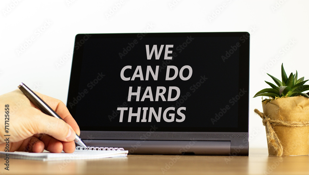 We can do hard things symbol. Concept words We can do hard things on beautiful black tablet. Beautiful white background. Businessman hand. Business, we can do hard things concept. Copy space. We can do hard things symbol. Concept words We can do hard things on beautiful black tablet. Beautiful white background. Businessman hand. Business, we can do hard things concept. Copy space.