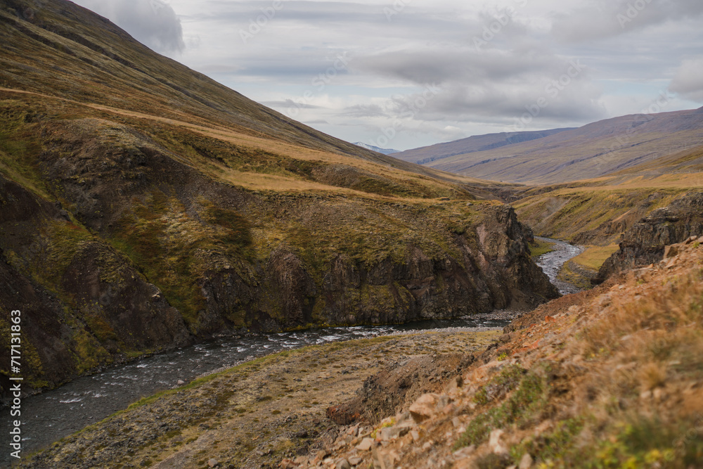 Traveling and exploring Iceland landscapes and famous places. Autumn tourism by Atlantic Ocean and mountains. Outdoor views on beautiful cliffs and travel destinations.