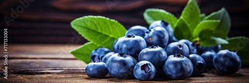 Delicious juneberries background banner for fresh and healthy summer vibes with ripe juicy berries photo