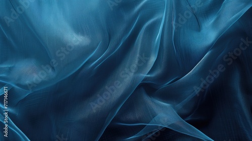 Close-up of blue synthetic fabric with a fine mesh texture photo