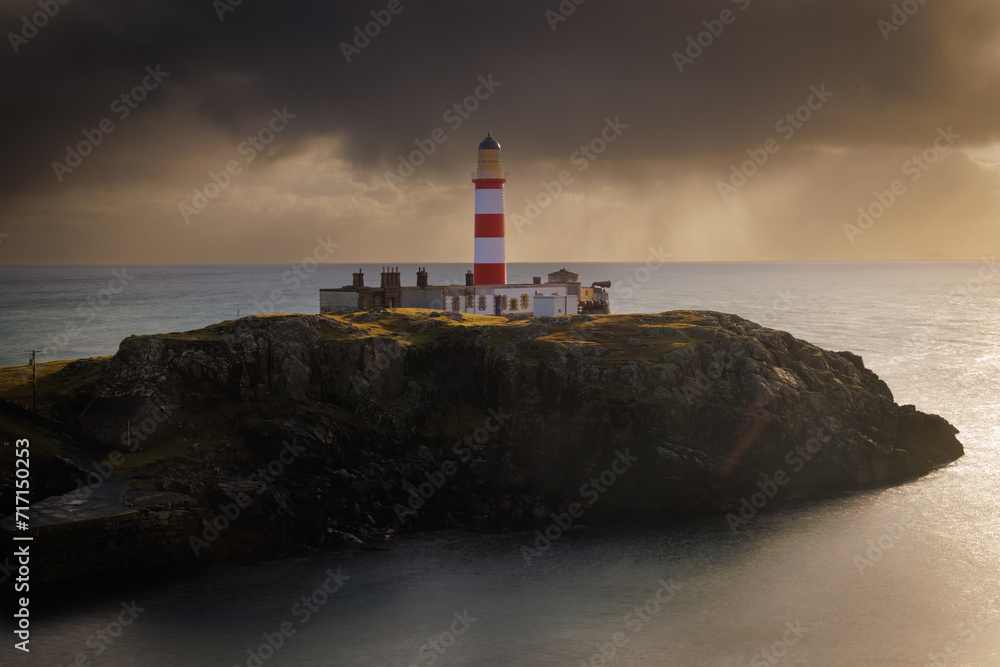 Stormy Lighthouse on an Outcrop