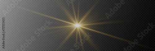 Special light flash effect with rays of light and magic sparkles. On a transparent background.