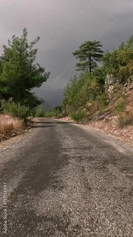 Country road driving, winding through mountains. Driving adventure on scenic country road. First-person view, driving along a mountainous country road Country road driving, winding through mountains. Driving adventure on scenic country road. First-person view, driving along a mountainous country road