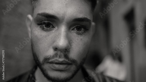 Gay transgender or nonbinary person wearing makeup. LGBTQ community. Black and white editing photo