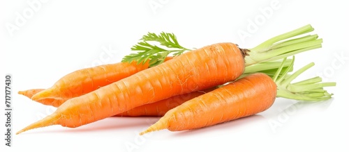 White background with isolated fresh and sweet carrot