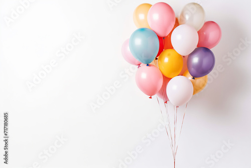 A group of colorful balloons against a white background