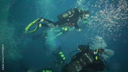 Wallpaper Mural Scuba divers submerged among many bubbles in big pool Torontodigital.ca
