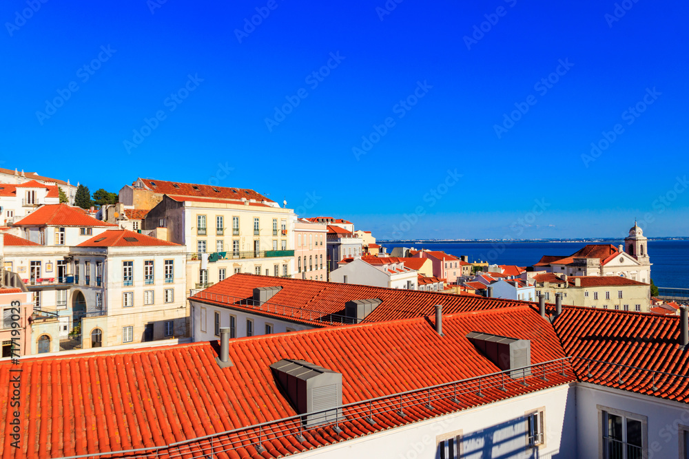 View of Alfama, the oldest neighborhood of Lisbon, from Santa Luzia viewpoint in Lisbon, Portugal
