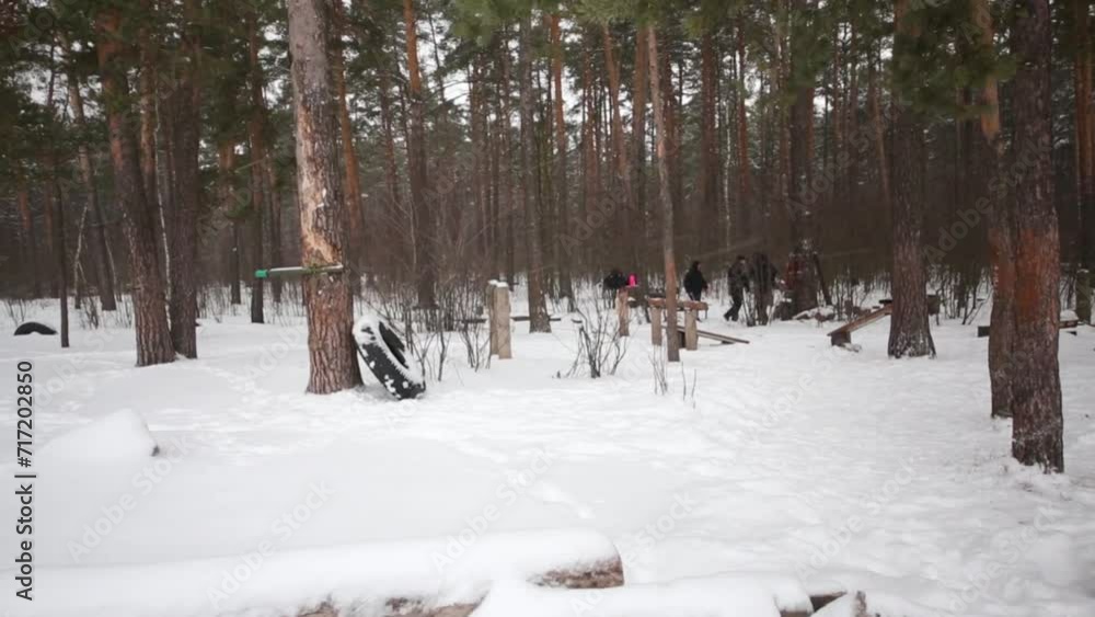 Approaching to outdoor sports camp in the snowy winter wood. Approaching to outdoor sports camp in the snowy winter wood.