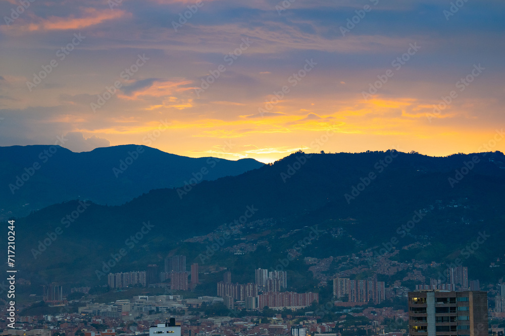 beautiful sunset with many colors on the horizon during dusk in south american metropolis