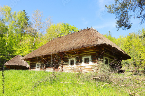  Traditional wooden Ukrainian house in Pirogovo, Ukraine © Lindasky76