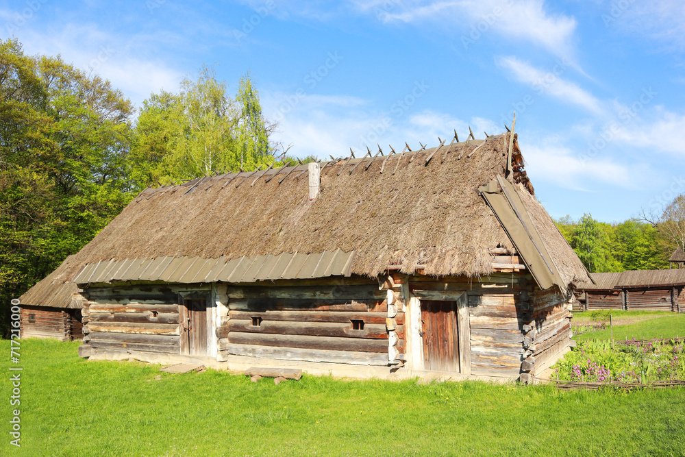 Traditional Ukrainian wooden house from Polissya Region in Pirogovo, Ukraine Traditional Ukrainian wooden house from Polissya Region in Pirogovo, Ukraine