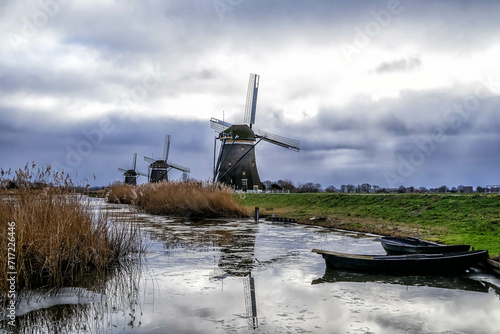 Winter landscape with traditional Dutch windmills in Leidschendam, near The Hague, Netherlands, Holland, Europe photo