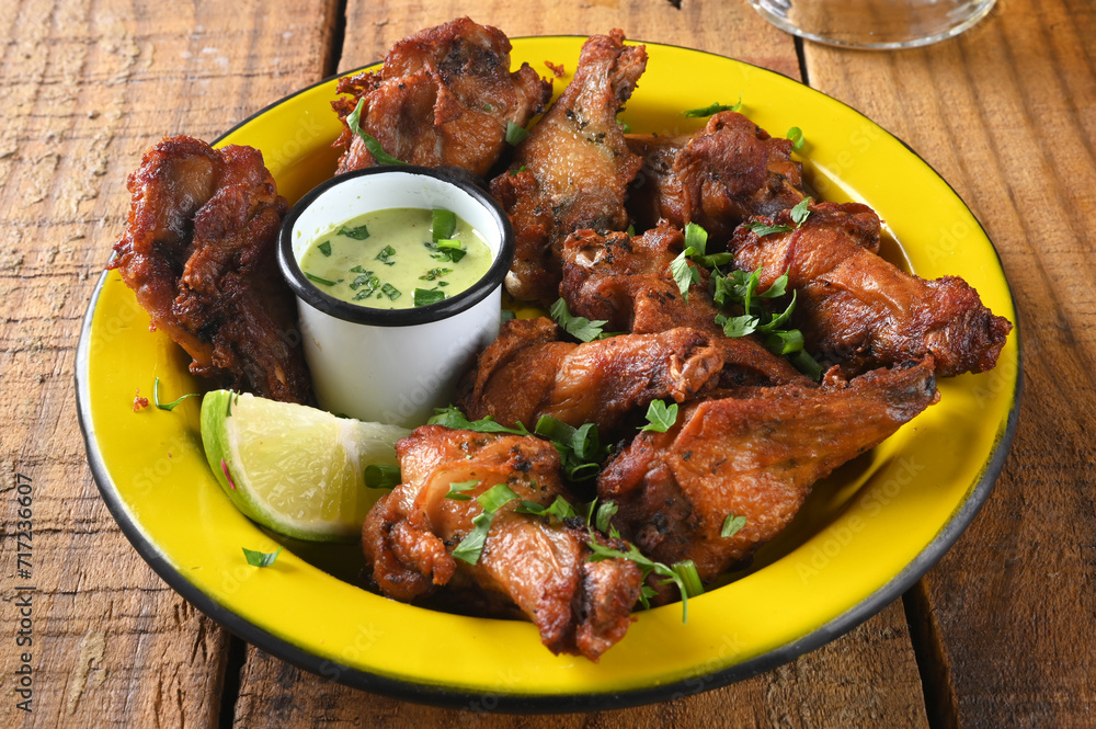 Fototapeta premium fried chicken seasoned with herbs herb sauce mayonnaise tasty food