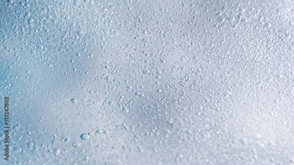 Super Slow Motion Shot of Bubbling Light Blue Background at 1000fps. Super Slow Motion Shot of Bubbling Light Blue Background at 1000fps.