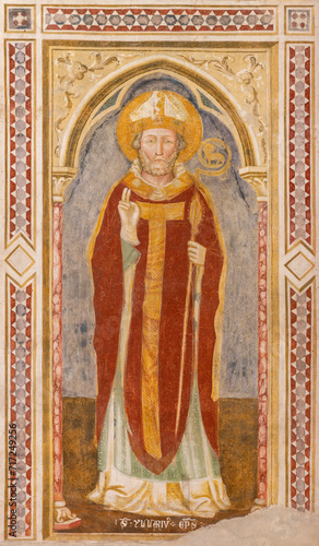 TREVISO, ITALY - NOVEMBER 4, 2023: The fresco of St. Hilarius in the church Chiesa di San Francesco by disciples of Tomaso da Modena (1351).