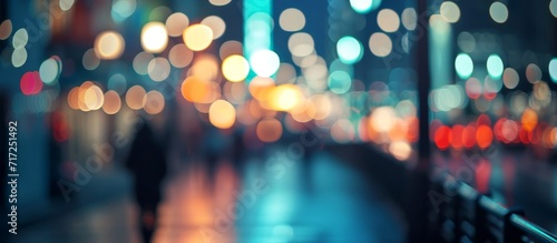 Blurred lights in the city streets at Kobe Harbor Land, serving as a bokeh background. photo
