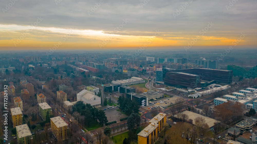 Cityscape top view. Italian city view from a drone Sunset in cloudy weather, view from a drone of the city of San Donato Milanese, Milan, Italy