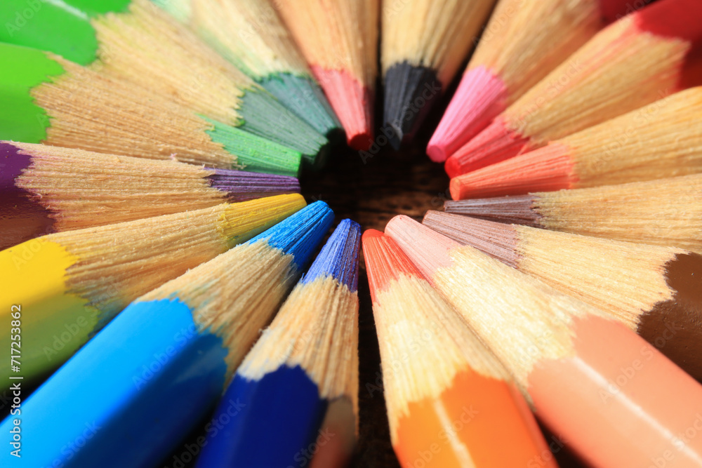 Macro photo of colored pencils together in a circle. Concept of desk tools. Macro photo of colored pencils together in a circle. Concept of desk tools.