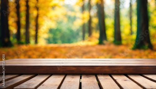 Wooden board empty table in front of blurred background. perspective brown wood table over blur trees in forest background - can be used mock up for display or montage your products. autumn season.