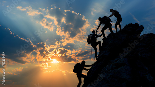 Teamwork at dusk: climbers uniting to conquer the summit © Massimo Todaro