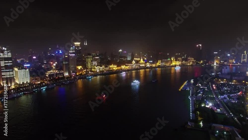 Seoul city with vessels on Hanghan river at autumn evening photo