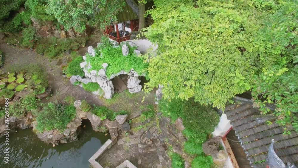National style buildings among plants in Yuyuan Garden at autumn National style buildings among plants in Yuyuan Garden at autumn